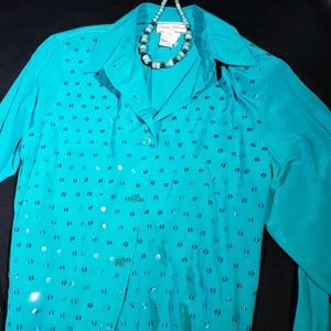 100% silk shirt with iridescent sequins sewn on it